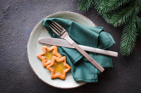 Christmas festive table setting with xmas decorations. Selective focus, space for text. Rustic...