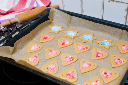 The process of making cookies and Christmas gingerbread at home. Dough for baking. Festive food,...