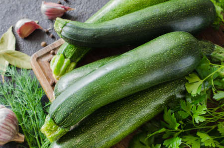 Organic zucchini, garlic and parsley, herbs and spices. Fresh farm productsの写真素材
