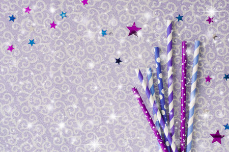 Eco friendly paper straws with various pattern in purple color for Christmas or New Year party....
