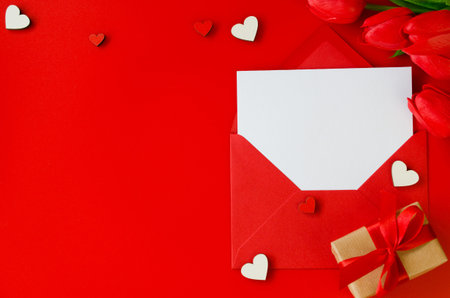Greeting card for Valentine's Day, Woman's Day or Mother's Day. Red envelope with blank paper,...