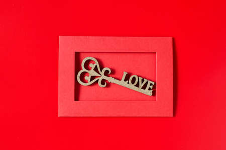 Greeting card for Valentine's Day. Red envelope with a love message. Valentine's day background. Top view. Flat layの写真素材