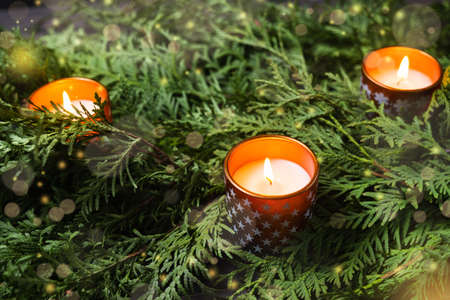 Christmas or Winter background with decorations, fir branches and candles.の写真素材