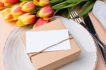 Festive Table place with gift and backup card.の写真素材