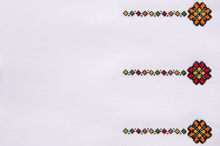 Texture of Cotton Fabric with Element of Handmade Embroidery. Design of Geometric Ethnic Pattern.の写真素材