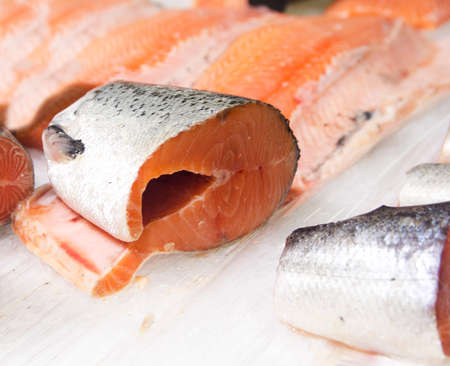 raw fish piles on the counter isの写真素材