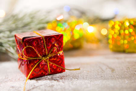 brightly colored gift boxes on wooden background, top view, new year and Christmas. Bright shade giftの写真素材