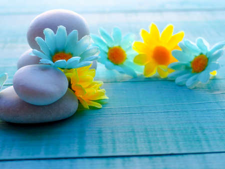 Spa still life with stones, flowers, water drops, relax, the calm, luxurious life, the concept of restoring health and youthの写真素材