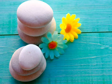 Spa still life with stones, flowers, water drops, relax, the calm, luxurious life, the concept of restoring health and youthの写真素材