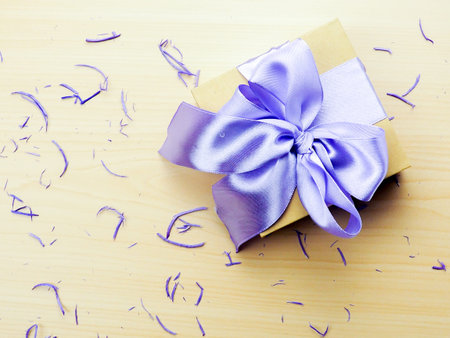 Vintage gift box on old wooden background.