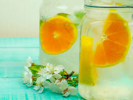 fruit and ice, orange and kiwi, the detox concept, space for textの写真素材