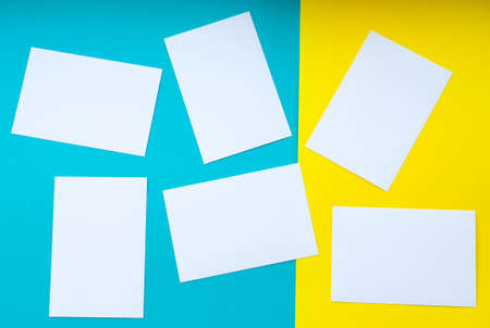 forms white to yellow and blue background, bright colours, empty space for textの写真素材