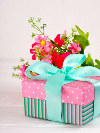 Gift or present box wrapped in kraft paper and flower for women, Gift for Mother.の写真素材