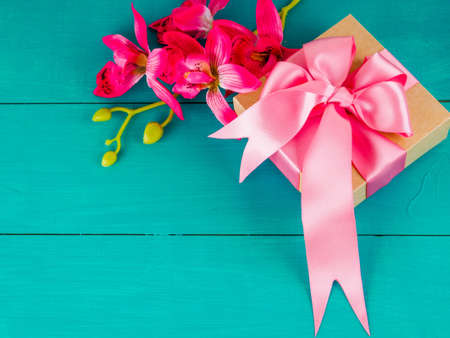 Gift or present box wrapped in kraft paper and flower for women, Gift for Mother.の写真素材