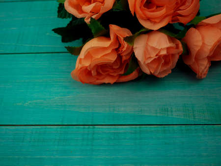 Roses on old wooden board, Valentines Day background, wedding dayの写真素材