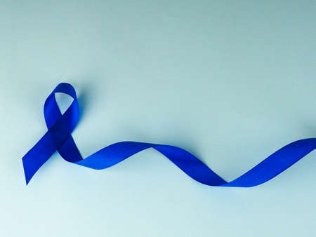 Blue ribbon awareness.Colon Cancer, Colorectal Cancer, Child Abuse awareness, world diabetes day.の写真素材