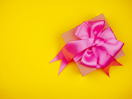 Cute decorated gift set gift with pink ribbon authentic on white background.