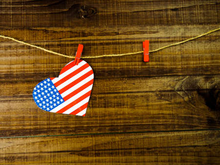 Flag of United States of America on heart shape with old vintage paper background, with clipping path - Independence Day.の写真素材