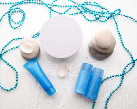 Cosmetic bottle containers with water drop, Blank label for branding mock-up, Natural beauty product conceptの写真素材