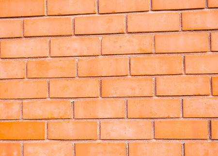 Red brown block brick wall Beautifully arranged texture background