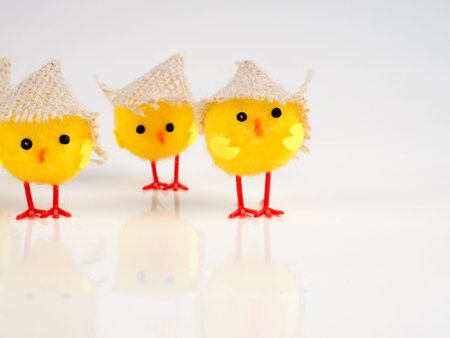 little baby toy chicken on a white background, a lot of chickens, the concept for Easter.の写真素材