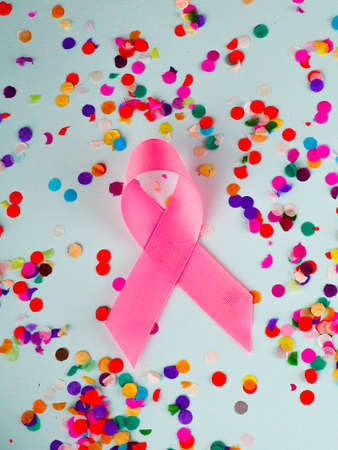 pink ribbon on multicolored background,Breast cancer awareness concept.の写真素材