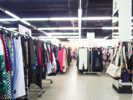 Abstract blurred photo of clothing store in a shopping mall, shopping concept.の写真素材