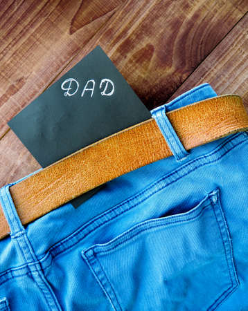 Father's Day card. Jeans pocket Masculine present for best daddy.の写真素材