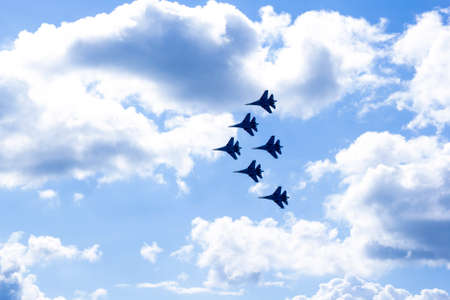 Three Airplanes In The Air, russian planes at airshow making figures in the sky, heart in the sky, loop,の写真素材