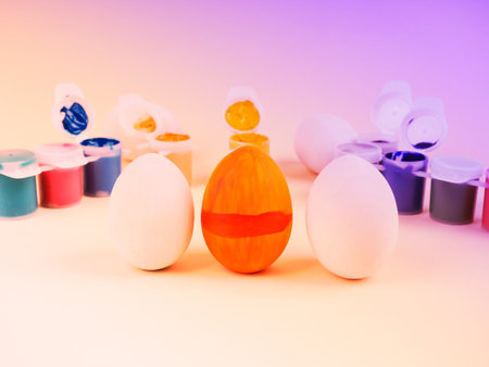 Easter wooden eggs to paint, tubes of paint for handmade jewelry.