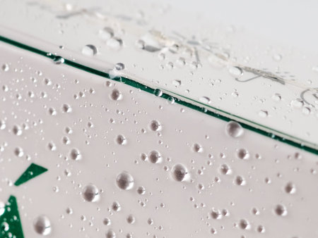 Water Drops On White Table.