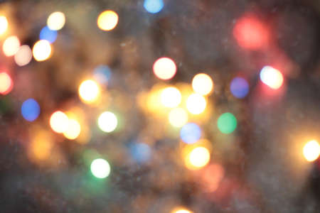 Christmas garlands, abstract blurred background with blurred lights of different colors. Christmas background, backdrop, backgroundの写真素材