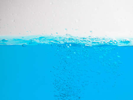 background selective focus, blurred, water border, blue wave, Water splash.の写真素材