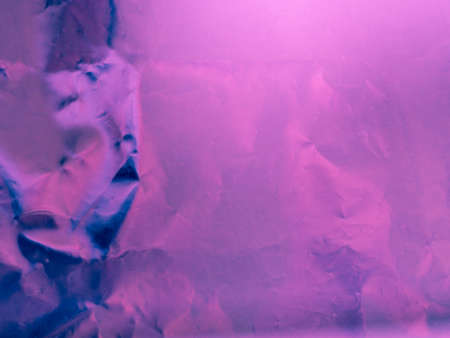 Abstract pink and defocused crumpled green foil texture for background. Artistic colorful bokeh. Toned image does not focus. Pattern for poster, print.の写真素材