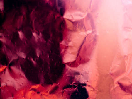 Abstract pink and defocused crumpled green foil texture for background. Artistic colorful bokeh. Toned image does not focus. Pattern for poster, print.の写真素材