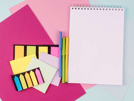 Office Table With Empty Notebook, paper stickers, Office tools. Education concept. Copy spaceの写真素材