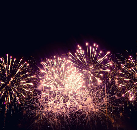 Fireworks light up the sky with dazzling display, the concept of the celebration of the event. The...