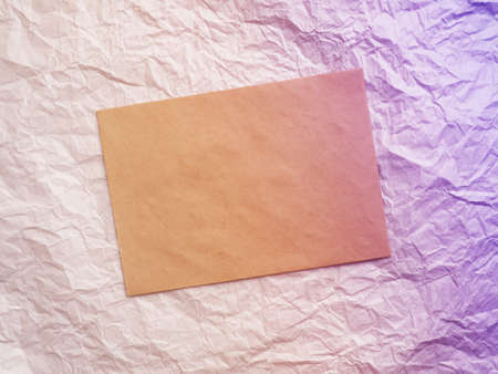 craft envelope on crumpled paper, place for design, send email.の写真素材