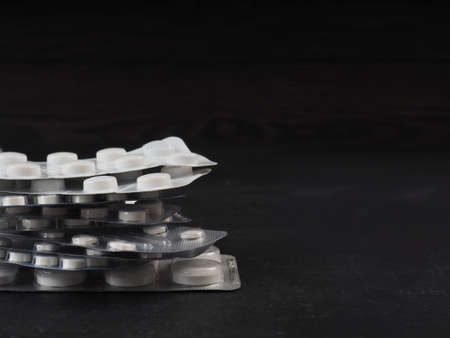 Different tablets, pills, medications drugs macro photo. Medicine, sicknessの写真素材