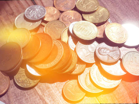 background of Euro and dollar banknotes and coins, the concept of Finance and poverty.の写真素材