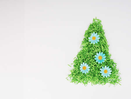 Christmas tree from recycled materials, paper through a shredder, the second life of things.の写真素材