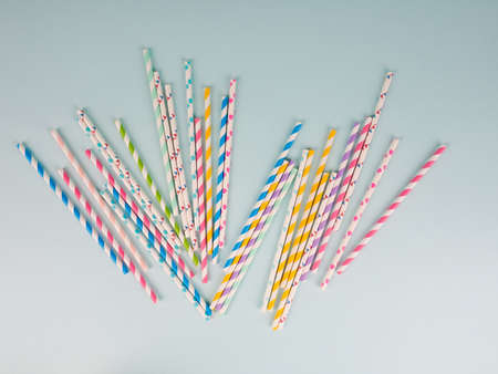 Group Of Cardboard Tubes For Cocktails. Top view of colorful paper disposable eco-friendly straws for summer cocktails. Drinking paper colorful straws for summer cocktailsの写真素材