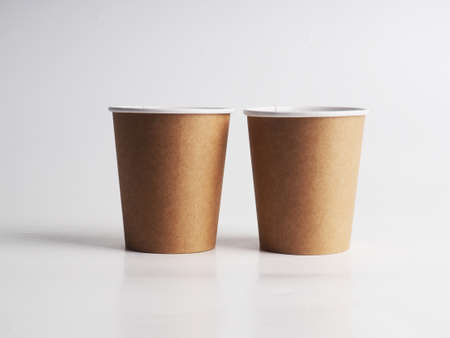 a few empty paper cups. Zero waste concept, paper tableware. Paper cup. Recycling. Eco-friendly disposable tableware. Eco dishesの写真素材