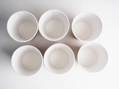 a few empty paper cups. Zero waste concept, paper tableware. Paper cup. Recycling. Eco-friendly disposable tableware. Eco dishesの写真素材