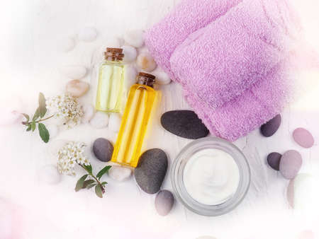 Spa accessories with stones, Composition of spa treatment on table colorful background.の写真素材