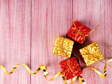 the concept of the Christmas banner, gift shiny toy boxes in a row