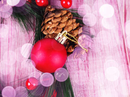 Christmas holiday wreath with balls on rustic red white wood.の写真素材
