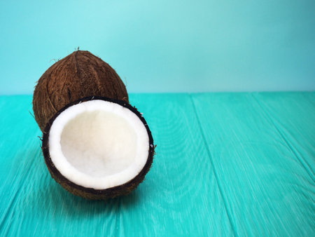 Dish Of Coconut Milk With A Split Fresh Coconut.の写真素材