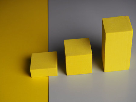 pedestal squares shadows on a yellow and gray background