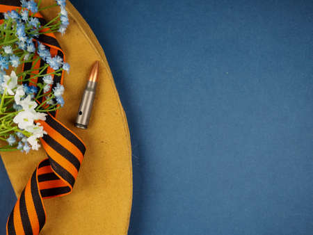 Victory Day Still Life, background for postcards by may 9, victory day: cap, letters, and St. George ribbonの写真素材